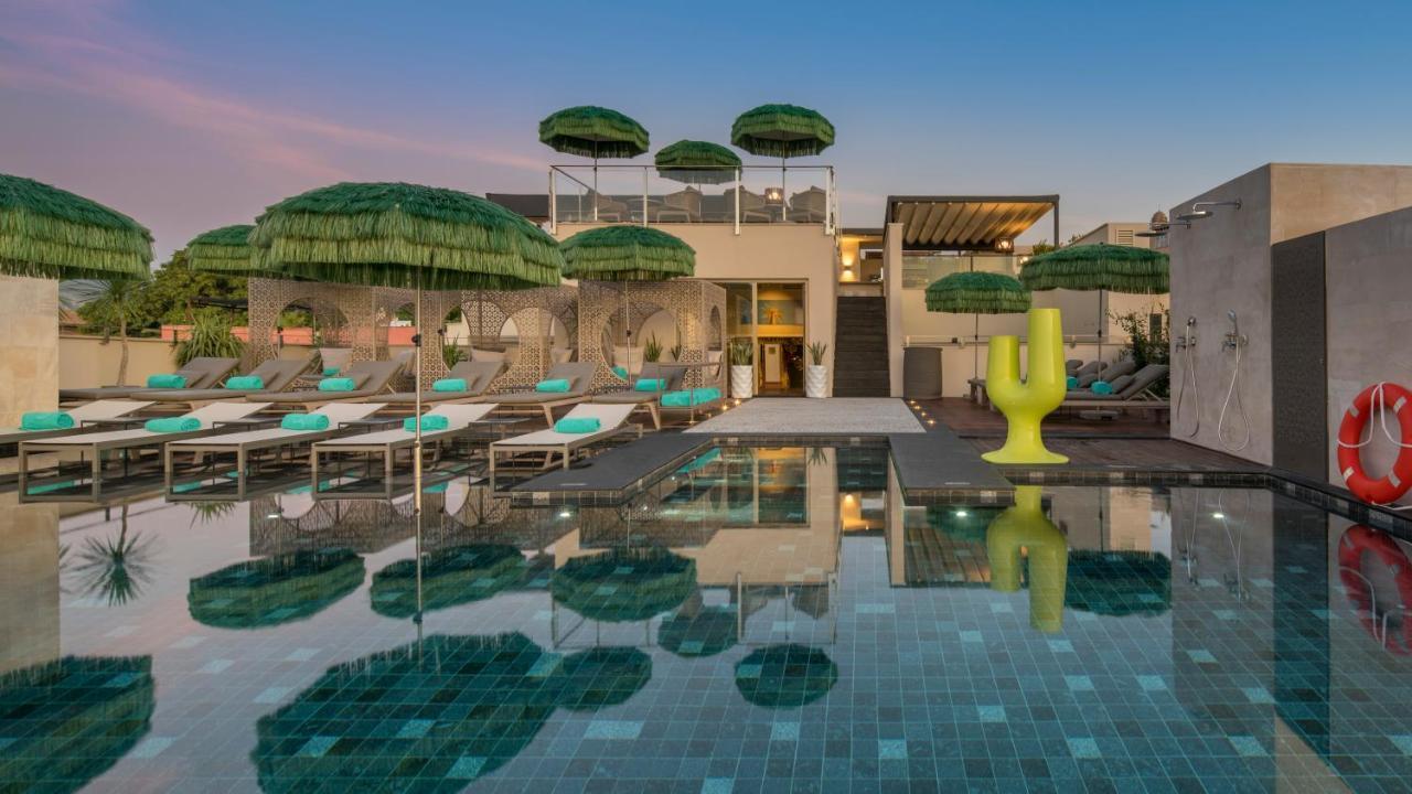 El Llorenc Parc De La Mar - Adults Only Palma de Mallorca Bagian luar foto The pool at the hotel