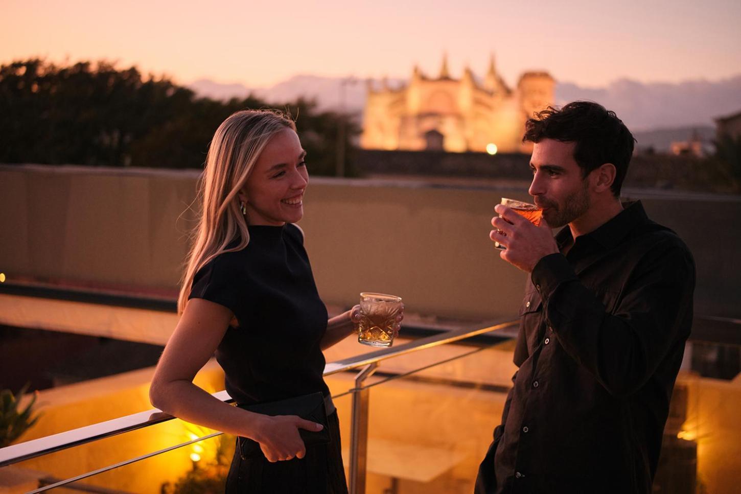 El Llorenc Parc De La Mar - Adults Only Palma de Mallorca Bagian luar foto A couple drinking cognac